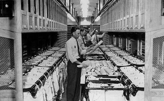 railway postal clerks sorting mail on a train