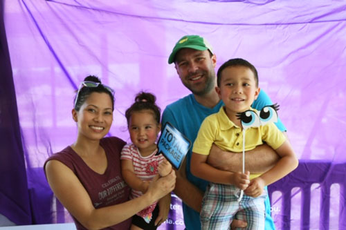 family poses for picture